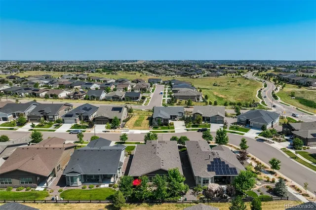 an aerial view of a city with lots of residential buildings