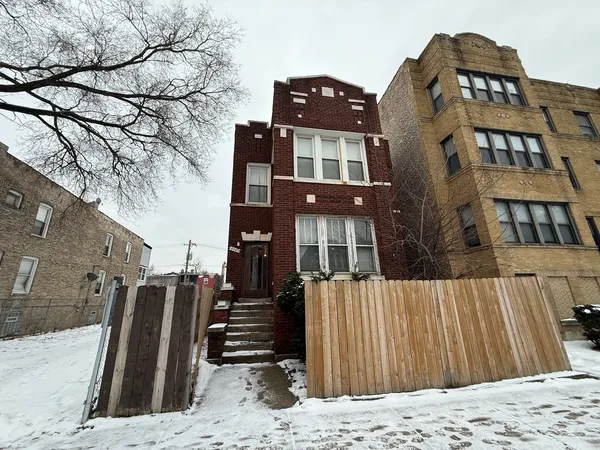 a view of a house with a snow on the wall