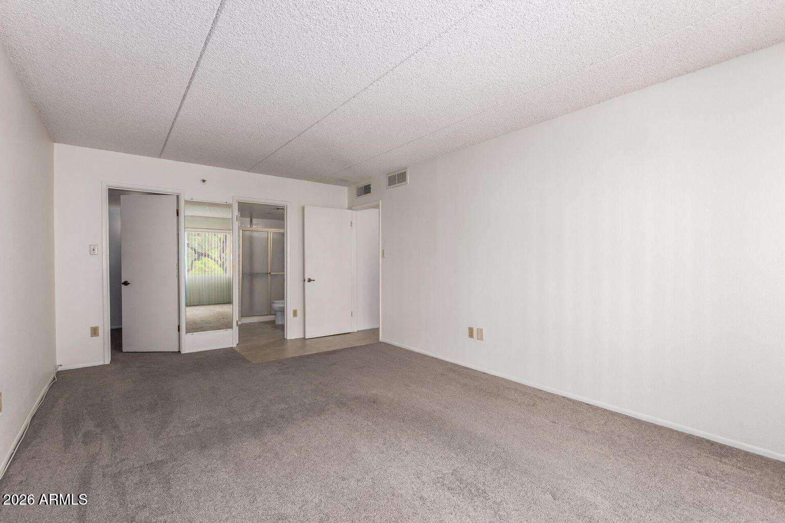 7950 East Camelback Road, Unit 28205 Scottsdale, AZ 85251 - Photo 21 of 23 a view of empty room