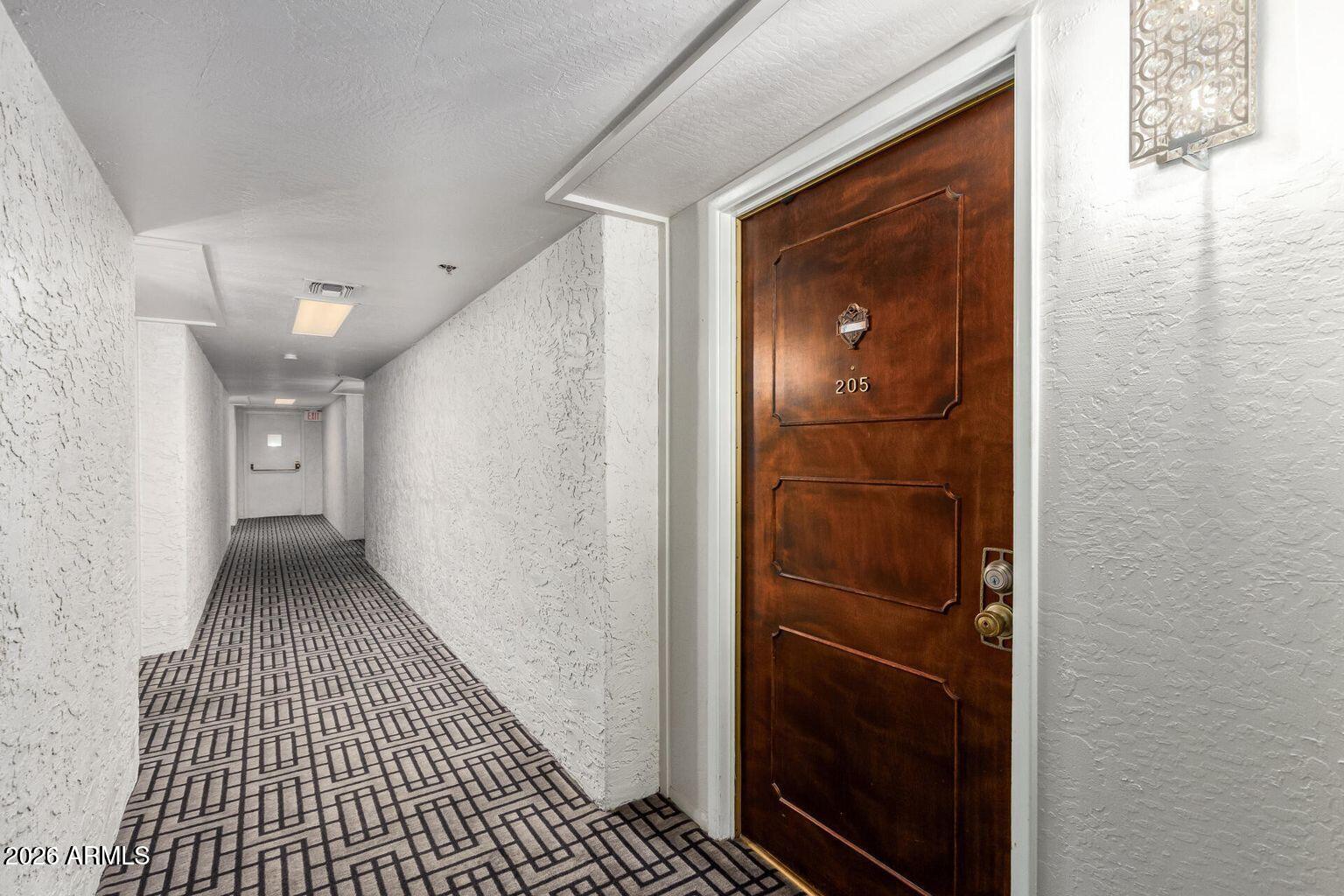 7950 East Camelback Road, Unit 28205 Scottsdale, AZ 85251 - Photo 4 of 23 a view of a hallway