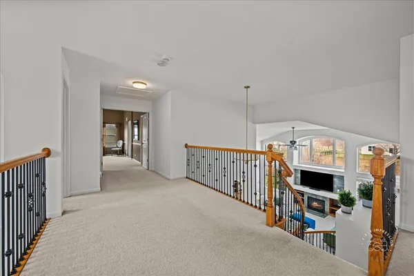 a view of a hallway with a livingroom