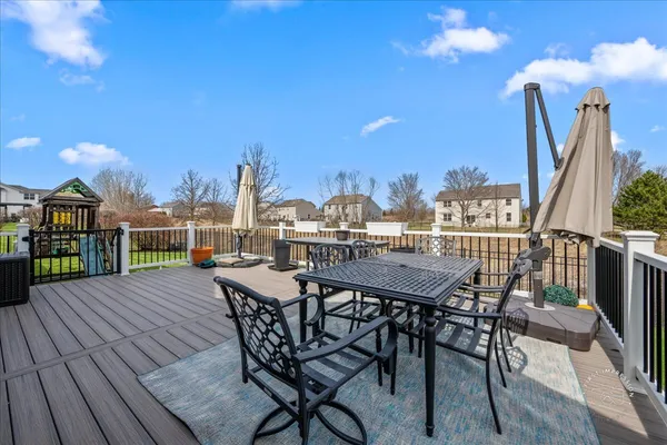 a view of a terrace with furniture