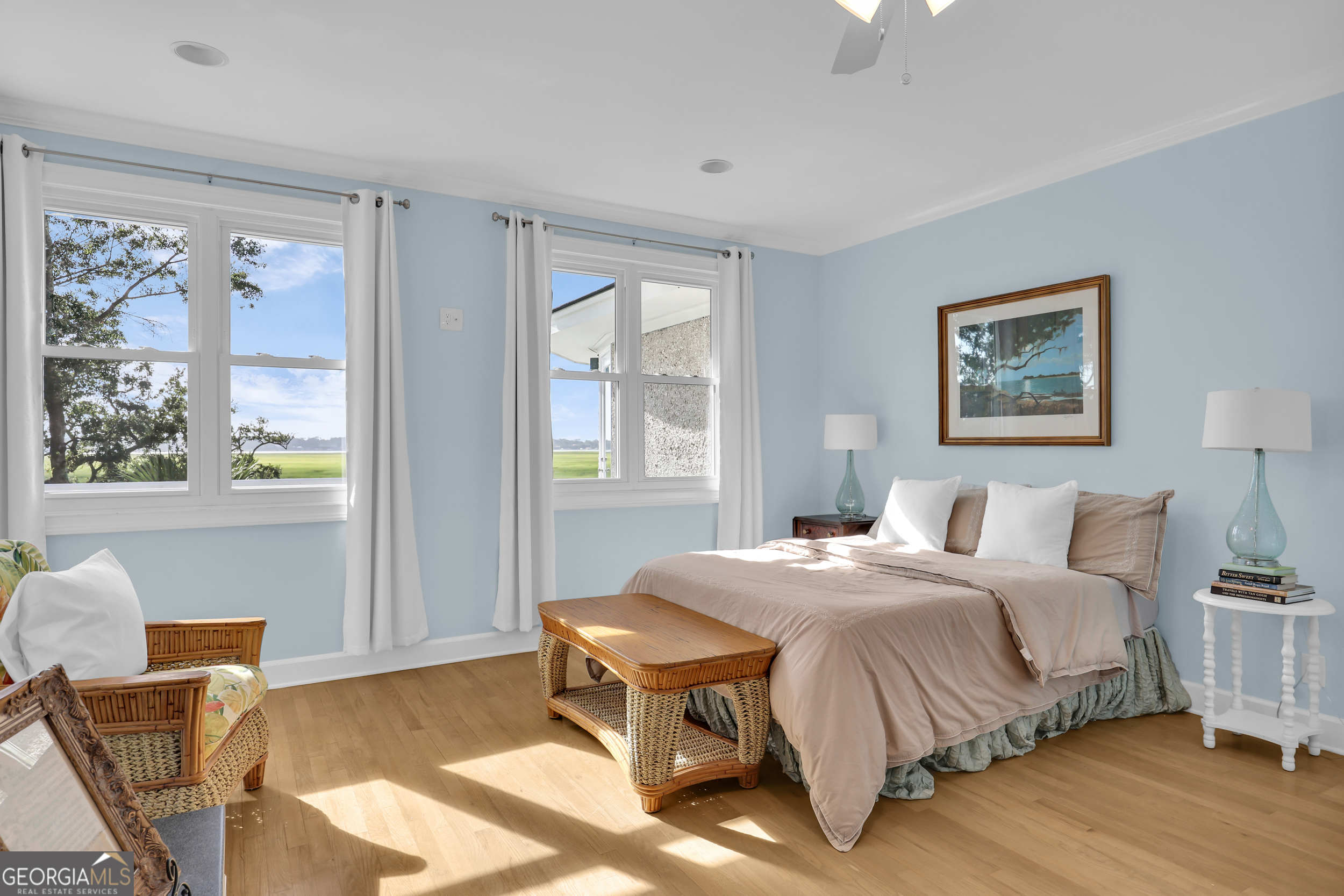 18 Modena Island Drive Savannah, GA 31411 - Photo 21 of 48 a bedroom with a bed and wooden floor