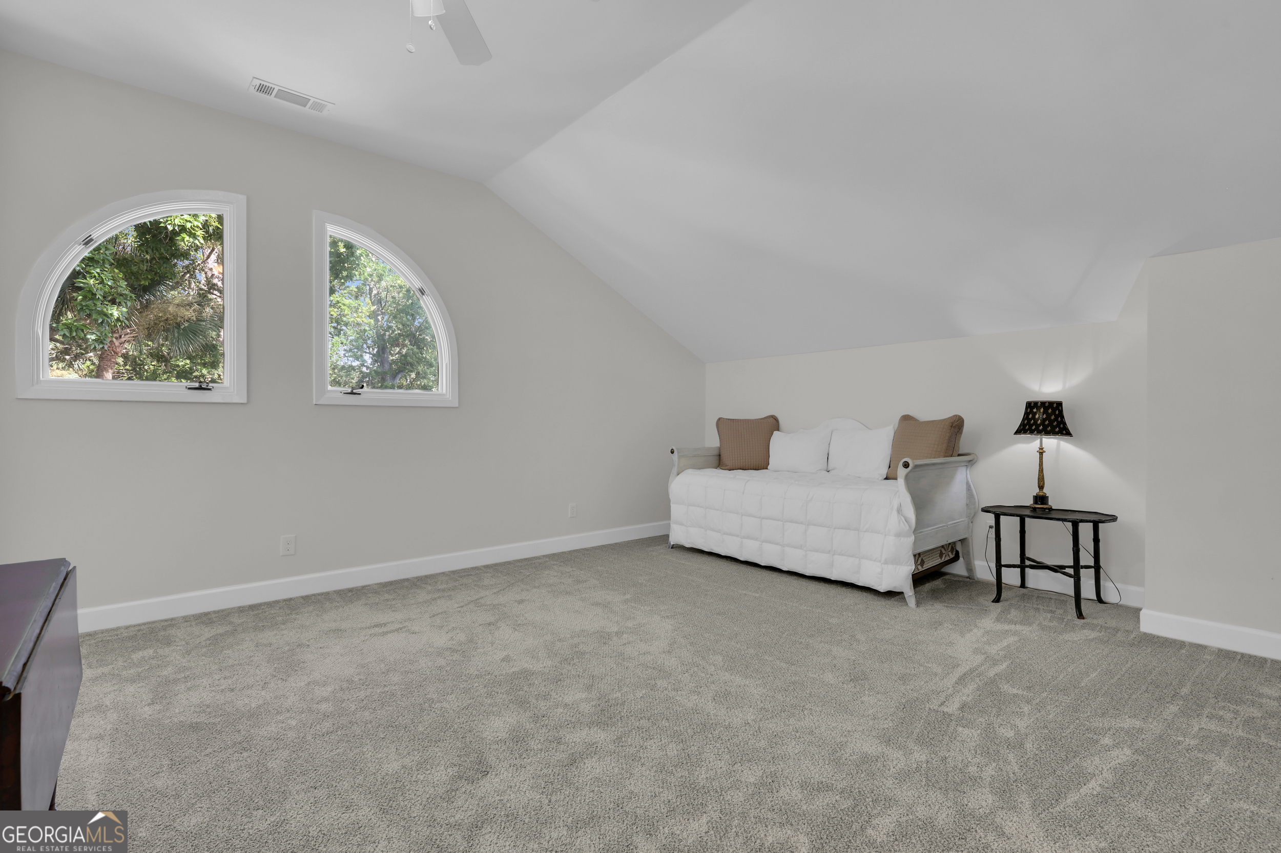 18 Modena Island Drive Savannah, GA 31411 - Photo 25 of 48 a bedroom with a bed and a night stand