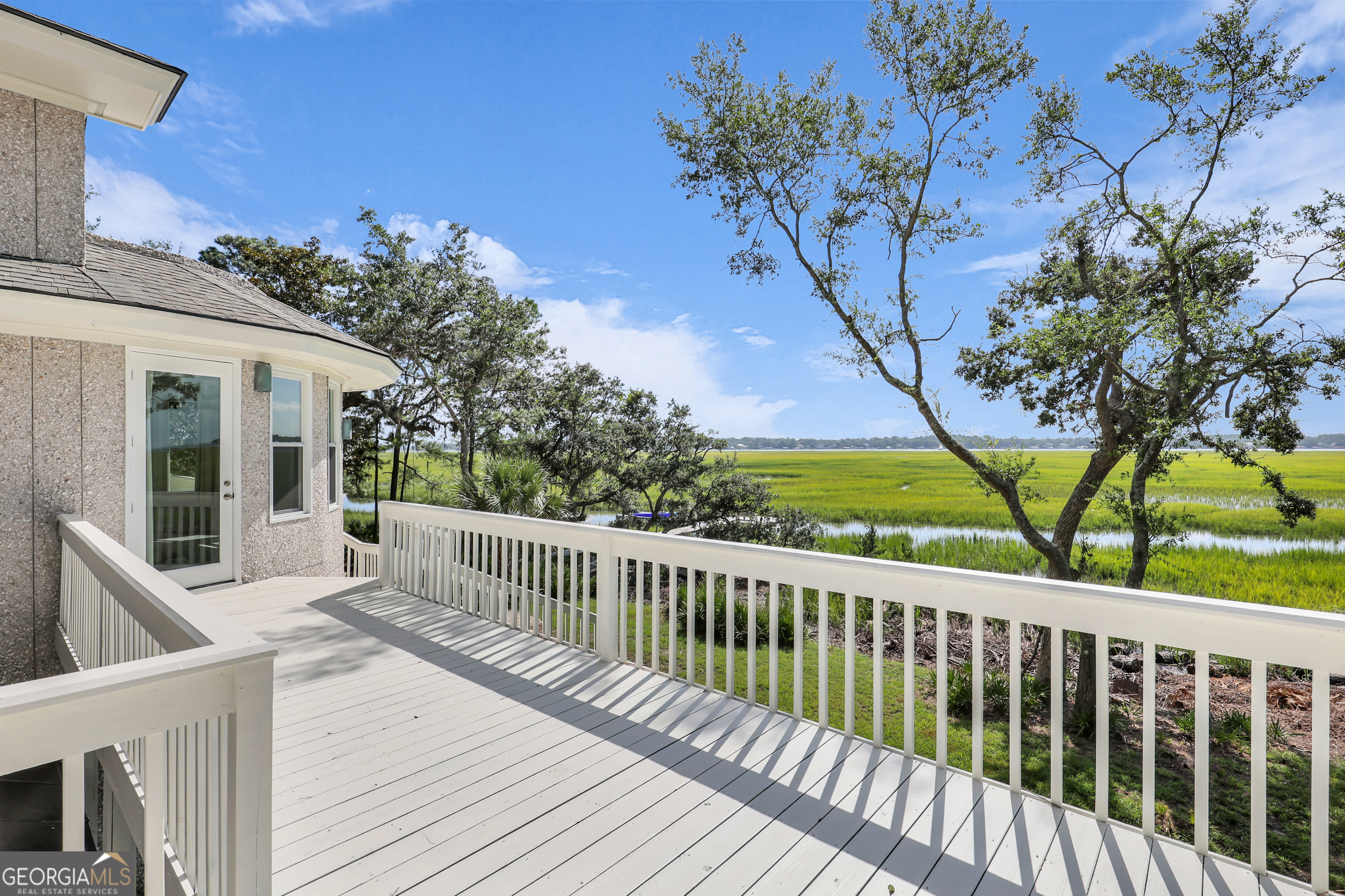 18 Modena Island Drive Savannah, GA 31411 - Photo 4 of 48 a view of a two chairs on the roof deck