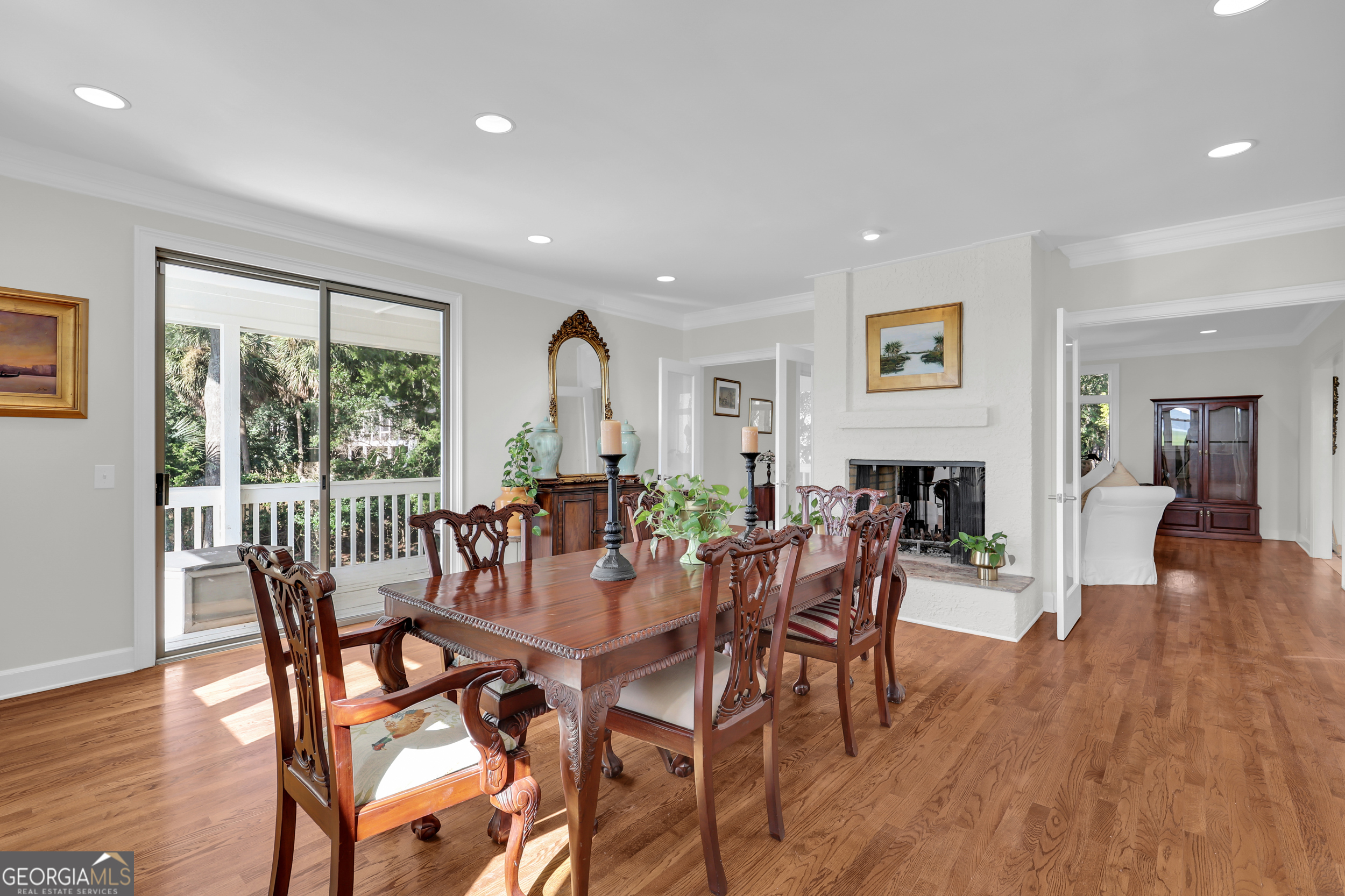 18 Modena Island Drive Savannah, GA 31411 - Photo 10 of 48 a view of a dining room with furniture window and wooden floor