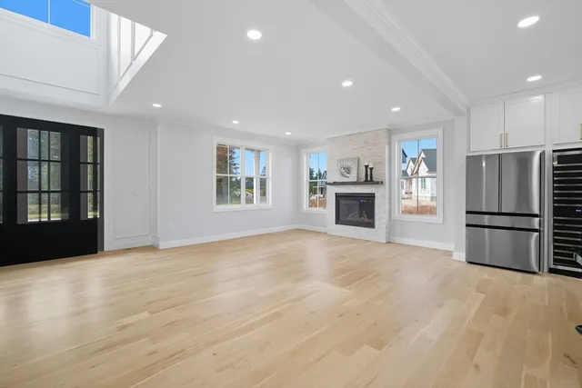 a view of kitchen with stainless steel appliances refrigerator and microwave