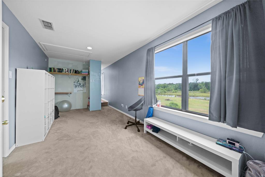 126 County Road, Unit 4212 Jacksonville, TX 75766 - Photo 23 of 39 a view of a room with gym equipment and a large window