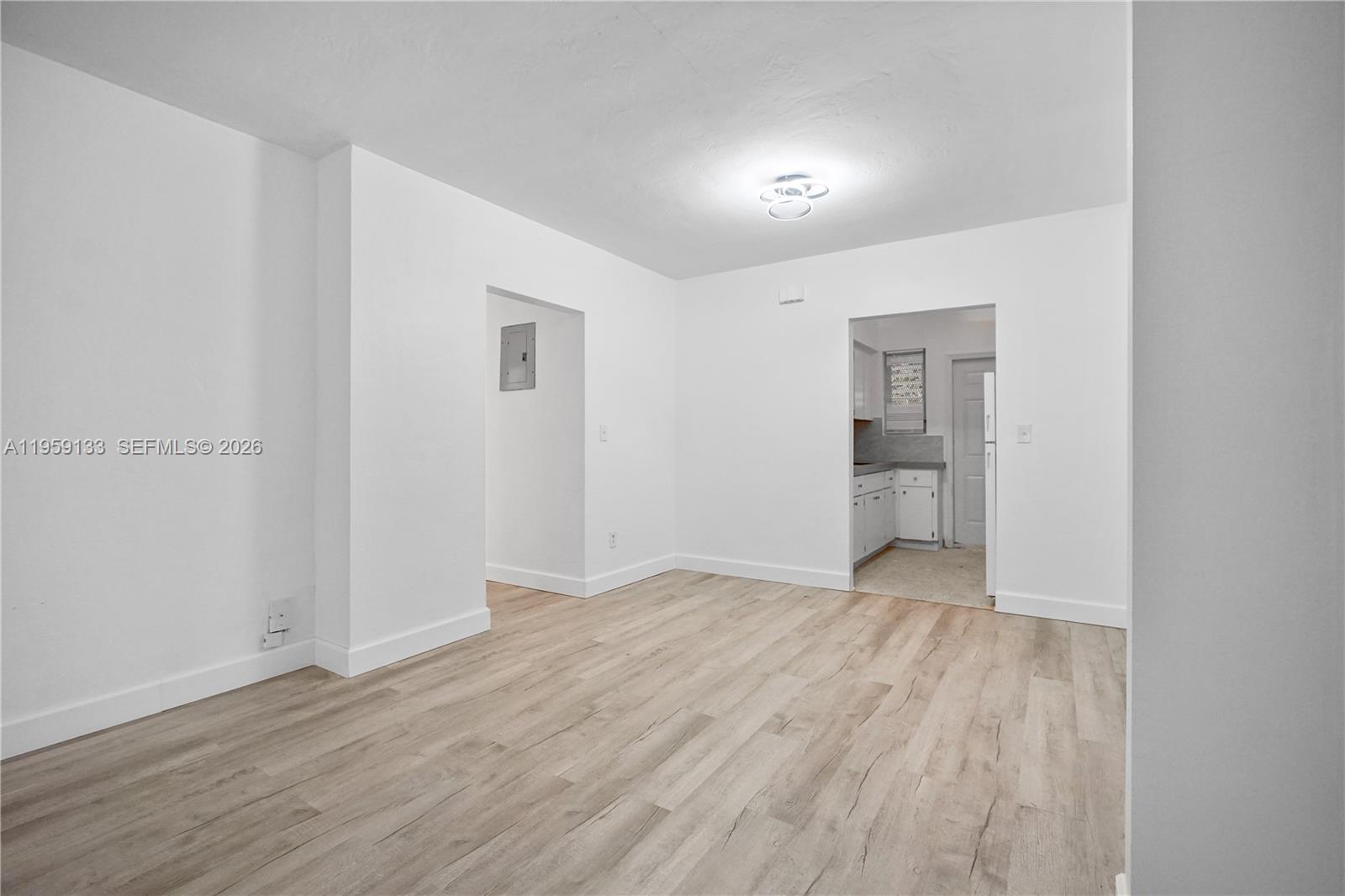 710 82nd Street, Unit 4 Miami Beach, FL 33141 - Photo 13 of 33 wooden floor in an empty room
