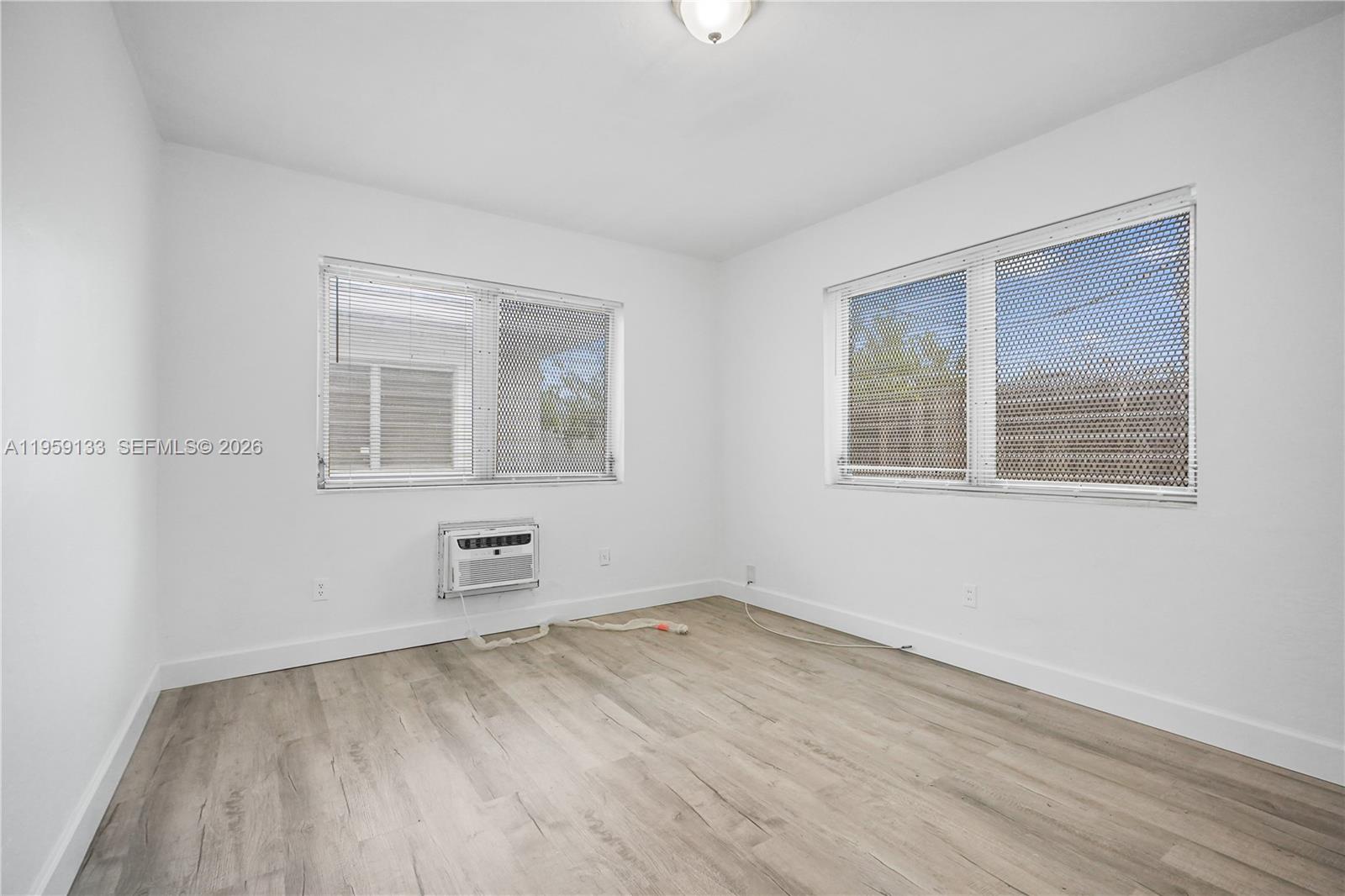 710 82nd Street, Unit 4 Miami Beach, FL 33141 - Photo 18 of 33 an empty room with a window