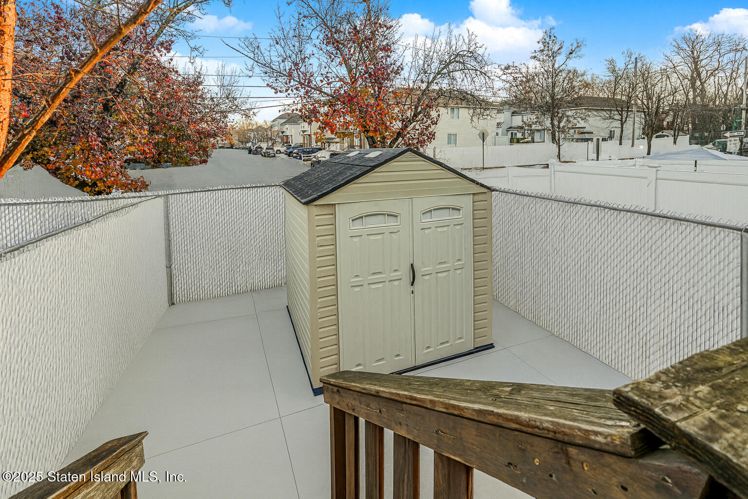 41 Crown Court Staten Island, NY 10312 - Photo 13 of 34 a view of a house with a snow in the yard