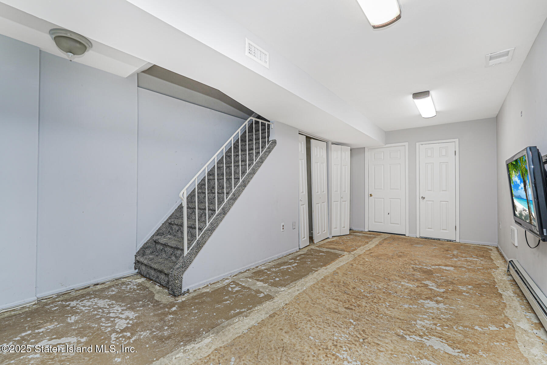 41 Crown Court Staten Island, NY 10312 - Photo 16 of 34 a view of a hallway with staircase