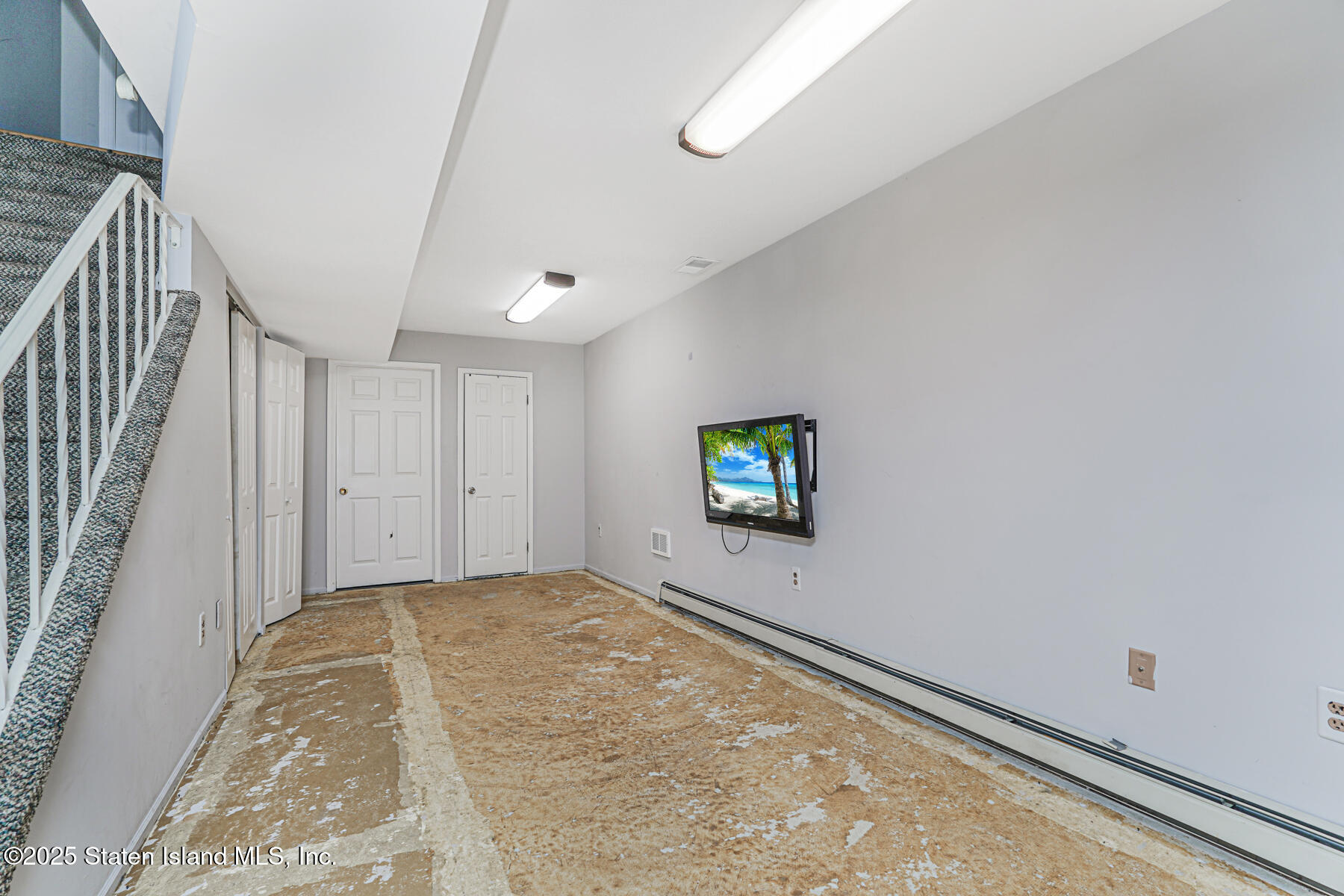 41 Crown Court Staten Island, NY 10312 - Photo 17 of 34 a view of a room with a flat screen tv