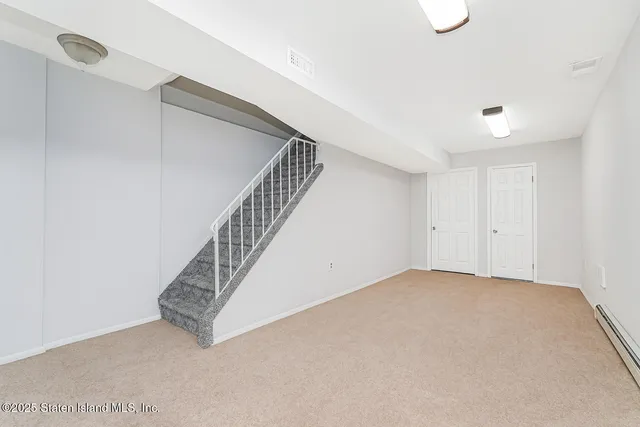 a view of a hallway with staircase