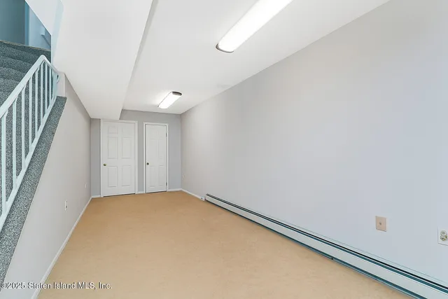 a view of a room with stairs