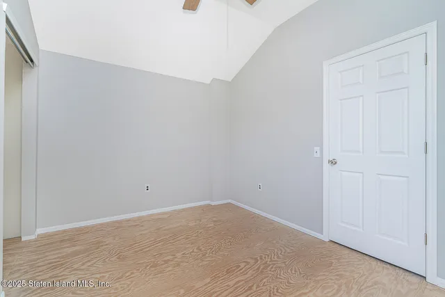 a view of a room that has a window in it