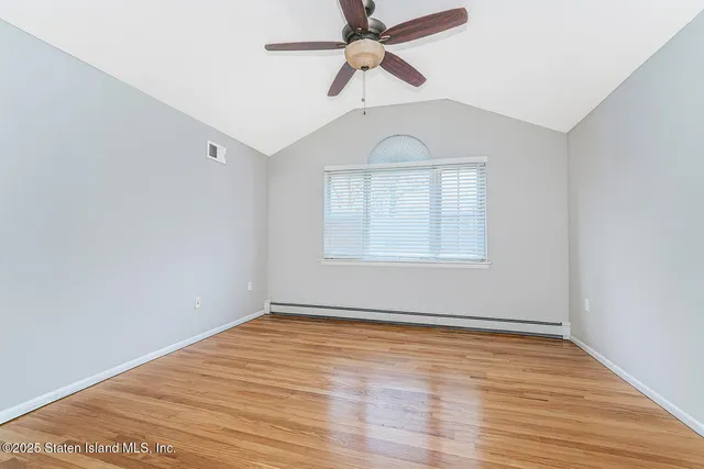 a view of a livingroom with a flat screen tv