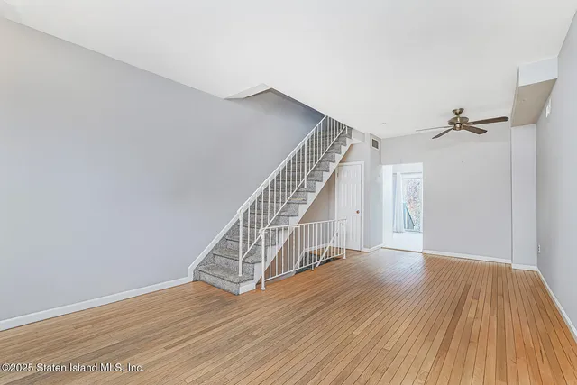 a view of entryway with wooden floor