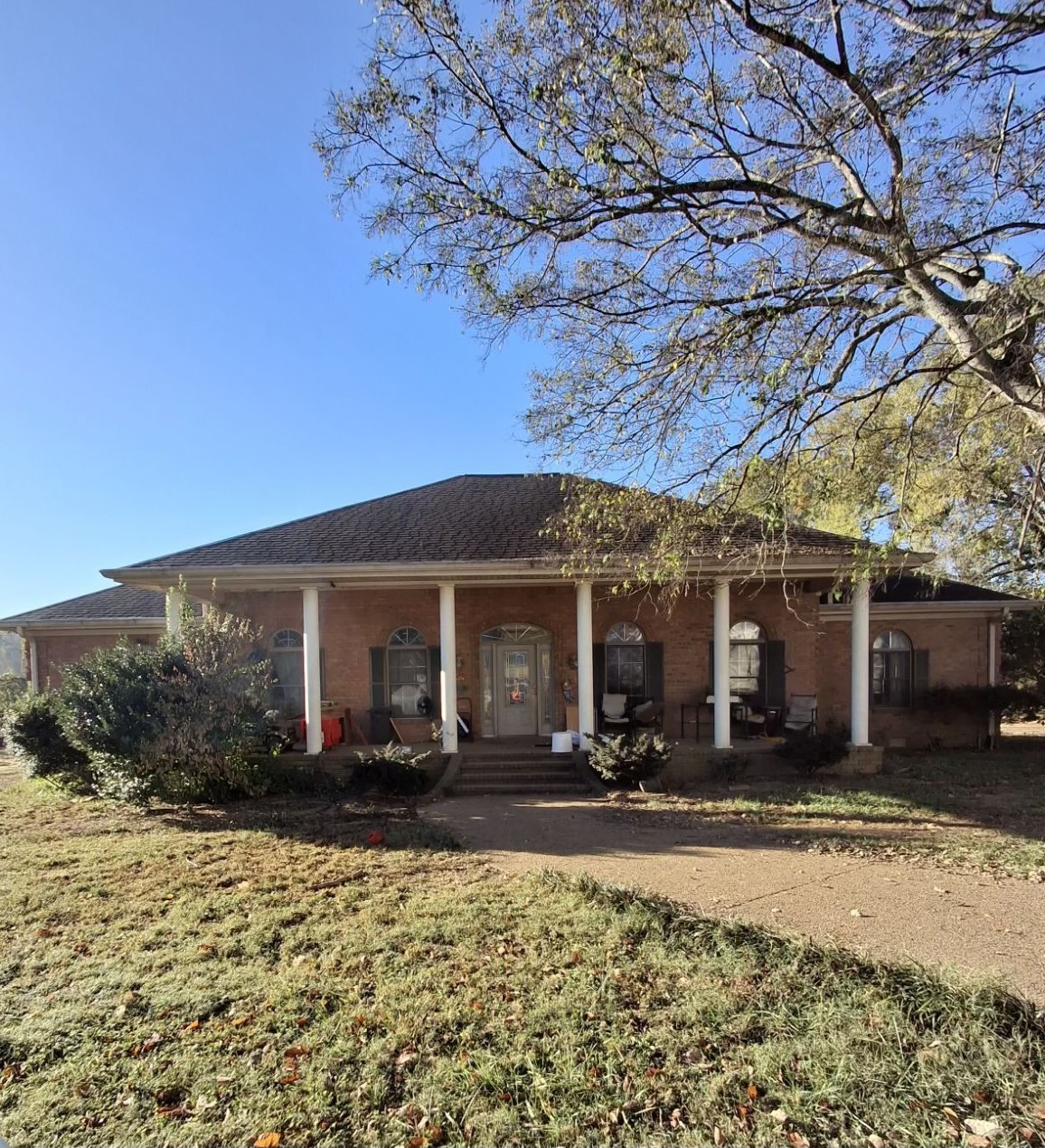 front view of a house with a patio