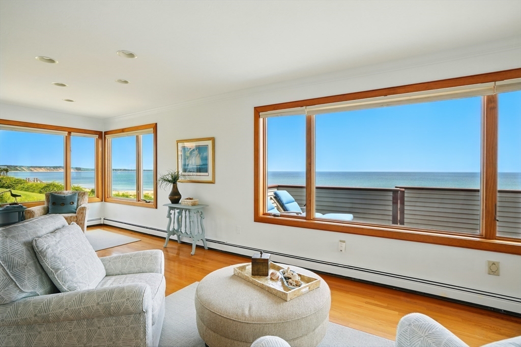 45 Phillips Road Bourne, MA 02562 - Photo 11 of 42 a living room with furniture and a large window