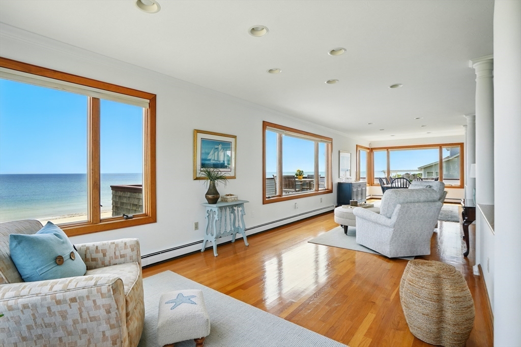 45 Phillips Road Bourne, MA 02562 - Photo 12 of 42 a living room with furniture and a large window