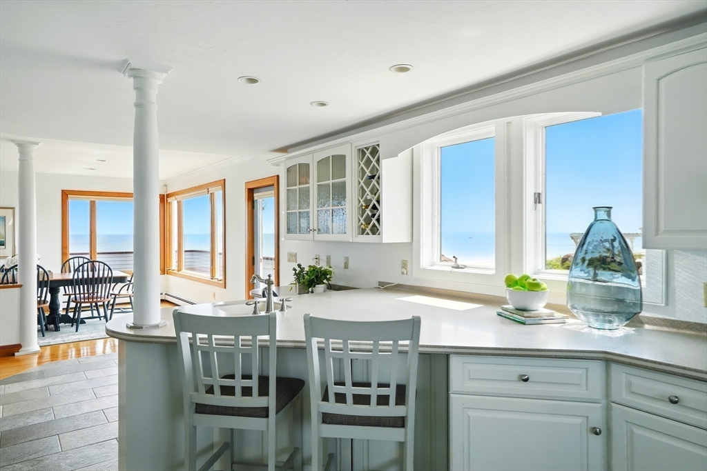 45 Phillips Road Bourne, MA 02562 - Photo 18 of 42 a kitchen with a sink cabinets and wooden floor