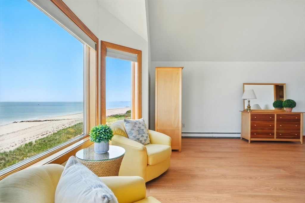45 Phillips Road Bourne, MA 02562 - Photo 24 of 42 a living room with furniture and a large window