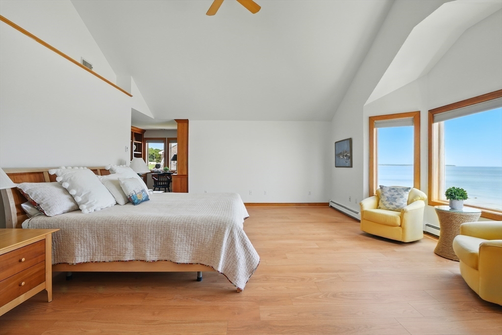 45 Phillips Road Bourne, MA 02562 - Photo 25 of 42 a bedroom with a bed and couch