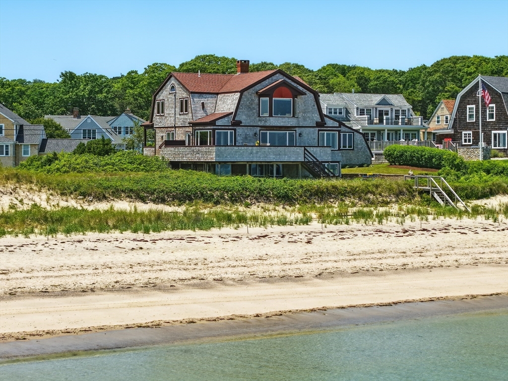 45 Phillips Road Bourne, MA 02562 - Photo 4 of 42 a front view of a house with a yard
