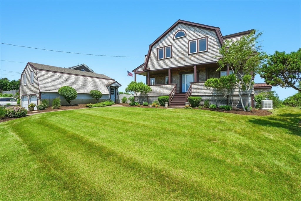 45 Phillips Road Bourne, MA 02562 - Photo 41 of 42 a view of house with garden and yard