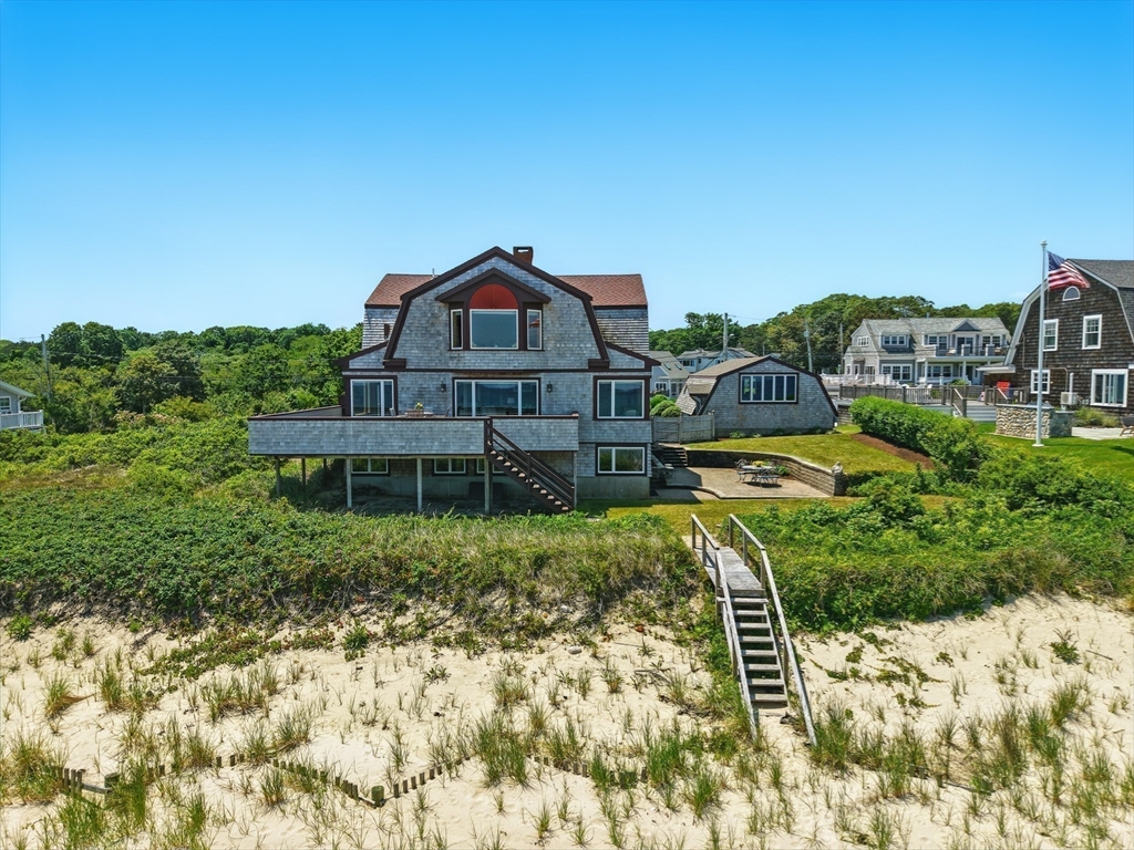 45 Phillips Road Bourne, MA 02562 - Photo 6 of 42 a front view of a house with a yard
