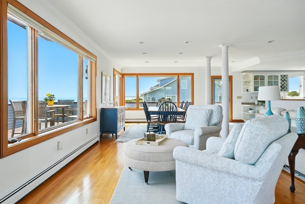 45 Phillips Road Bourne, MA 02562 - Photo 10 of 42 a living room with furniture and a large window