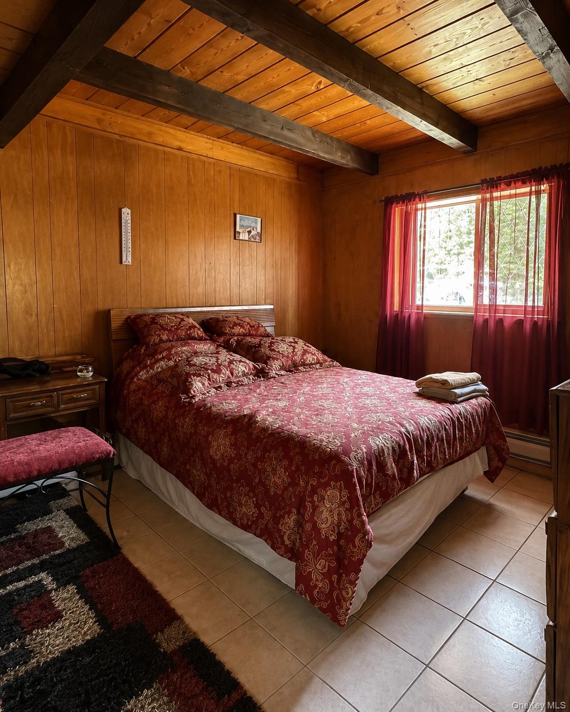 177 Davos Road Woodridge, NY 12789 - Photo 12 of 19 a bedroom with a bed and window