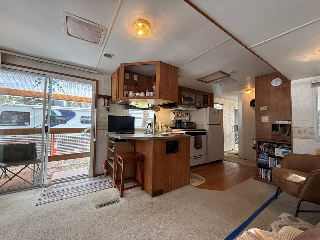 13 F Street Cascade, ID 83611 - Photo 7 of 26 Sliding Glass Doors Out to Deck