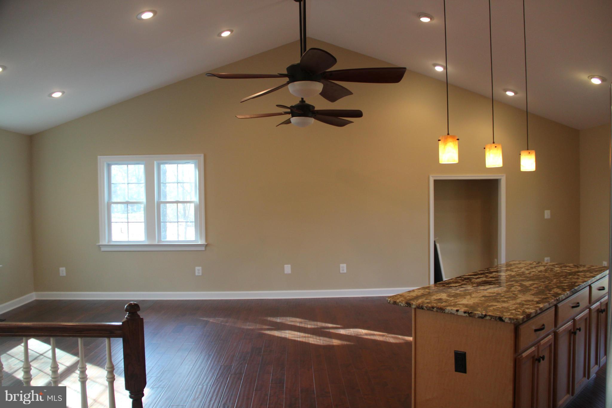 9504 Mountjoy Road Marshall, VA 20115 - Photo 9 of 27 a kitchen that has a stove and a wooden floor