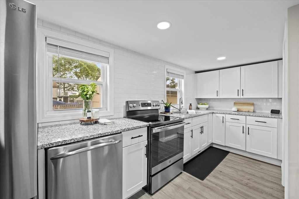 14 Pinehurst Drive Wareham, MA 02571 - Photo 14 of 41 a kitchen with appliances cabinets and a sink