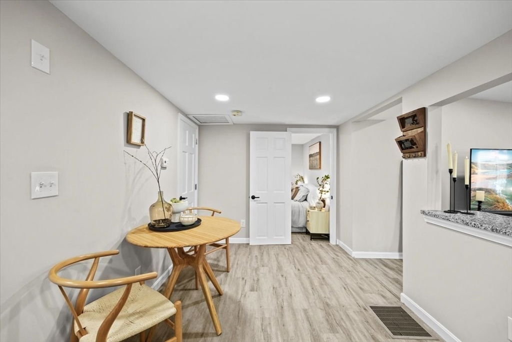 14 Pinehurst Drive Wareham, MA 02571 - Photo 21 of 41 a living room with furniture and a wooden floor
