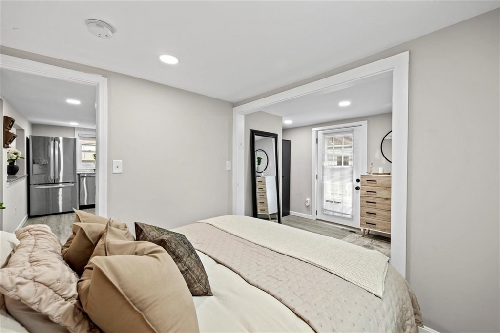 14 Pinehurst Drive Wareham, MA 02571 - Photo 22 of 41 a bedroom with furniture and a walk in closet