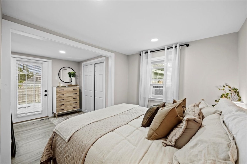 14 Pinehurst Drive Wareham, MA 02571 - Photo 23 of 41 a bedroom with a bed a dresser and a window