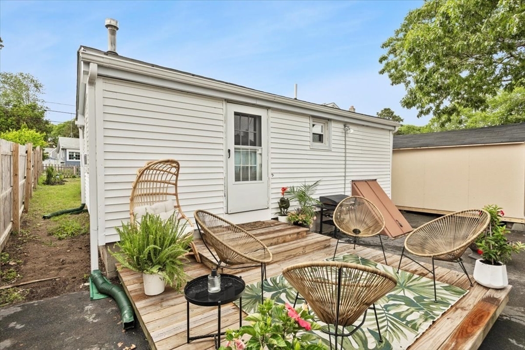 14 Pinehurst Drive Wareham, MA 02571 - Photo 35 of 41 a view of a chairs and table in patio