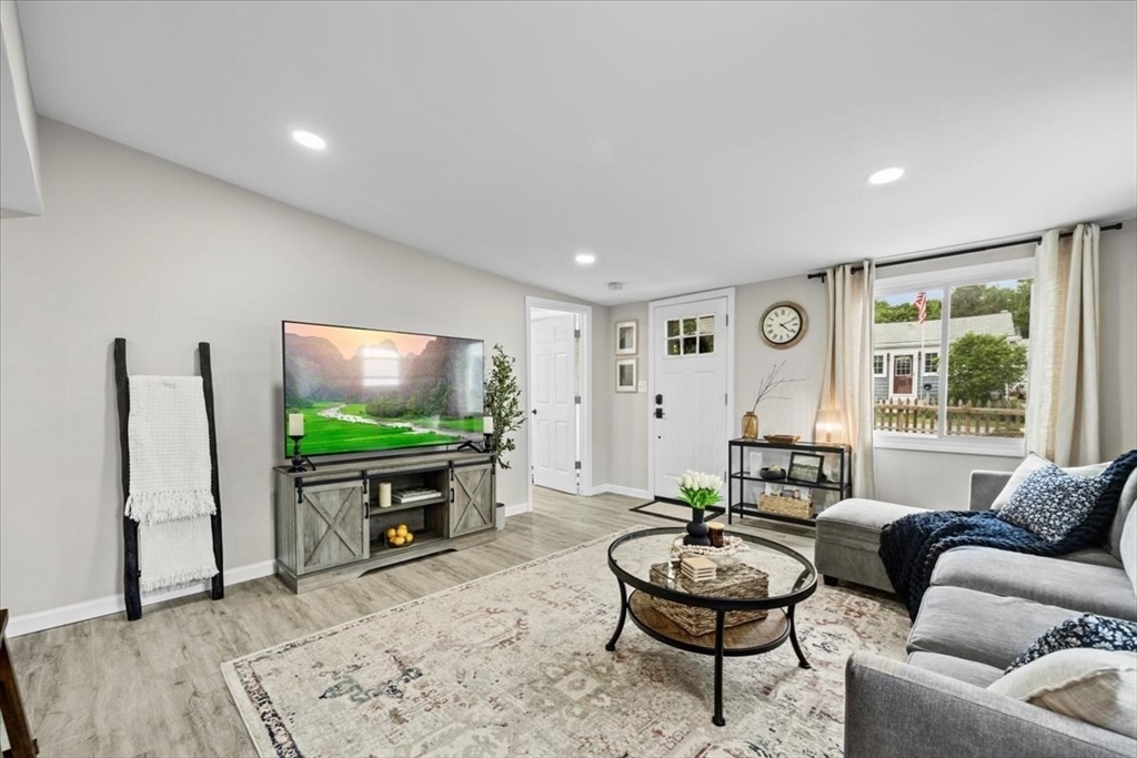 14 Pinehurst Drive Wareham, MA 02571 - Photo 4 of 41 a living room with furniture and a flat screen tv