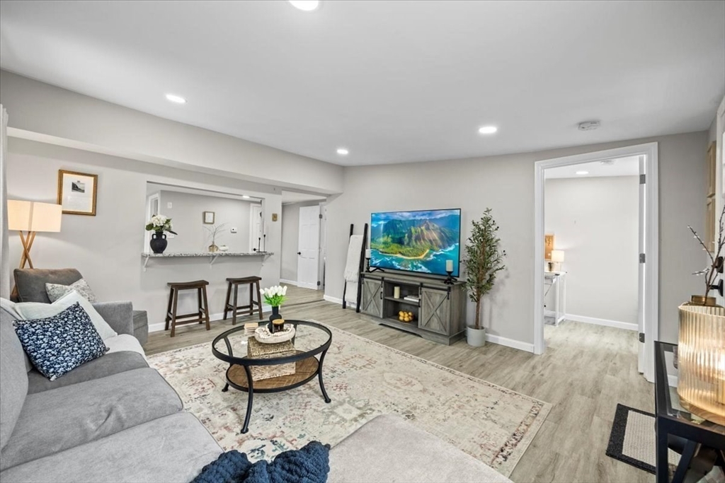 14 Pinehurst Drive Wareham, MA 02571 - Photo 5 of 41 a living room with furniture and a flat screen tv