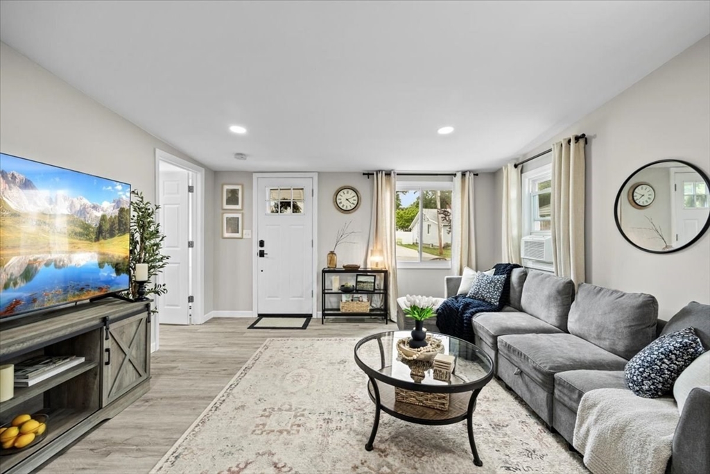 14 Pinehurst Drive Wareham, MA 02571 - Photo 8 of 41 a living room with furniture and a flat screen tv