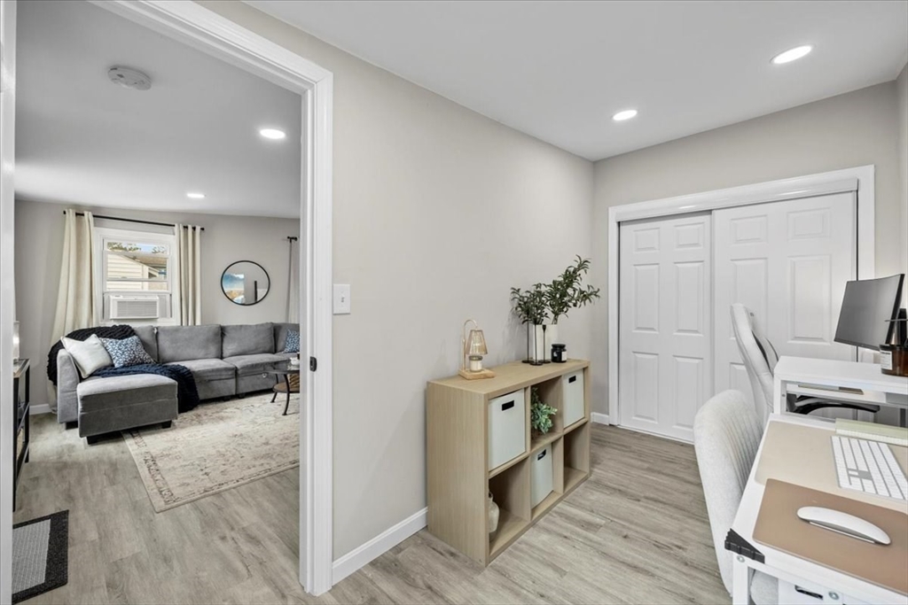 14 Pinehurst Drive Wareham, MA 02571 - Photo 9 of 41 a living room with furniture a couch and a potted plant