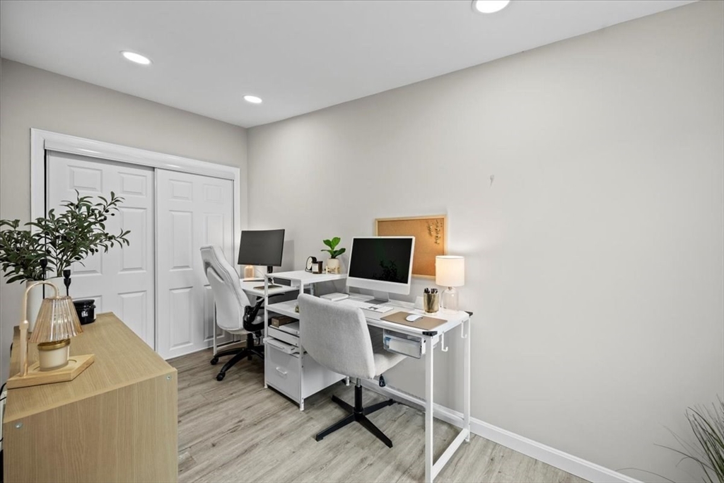 14 Pinehurst Drive Wareham, MA 02571 - Photo 10 of 41 a view of a workspace with furniture and a potted plant