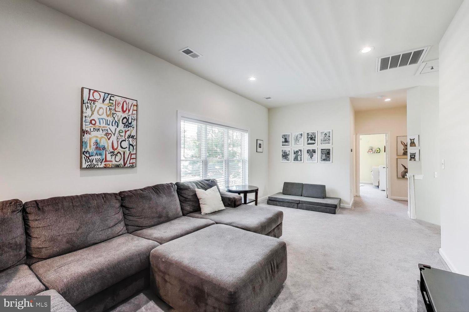 5408 Danville Street Springfield, VA 22151 - Photo 11 of 29 a living room with furniture and a large window