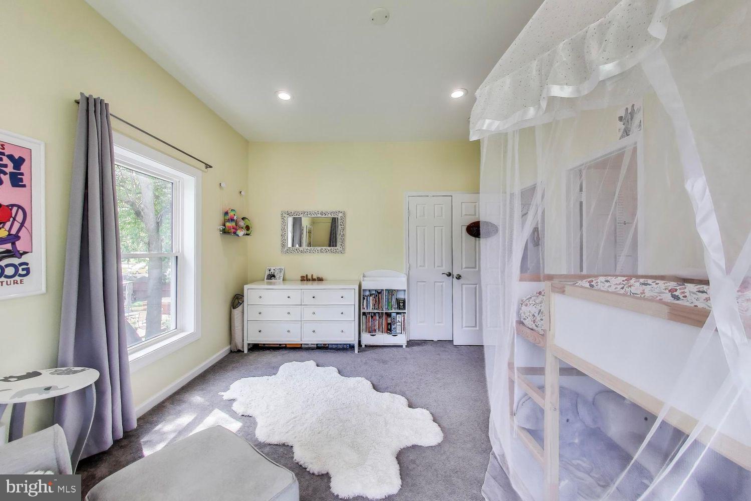 5408 Danville Street Springfield, VA 22151 - Photo 12 of 29 a bedroom with furniture and a window