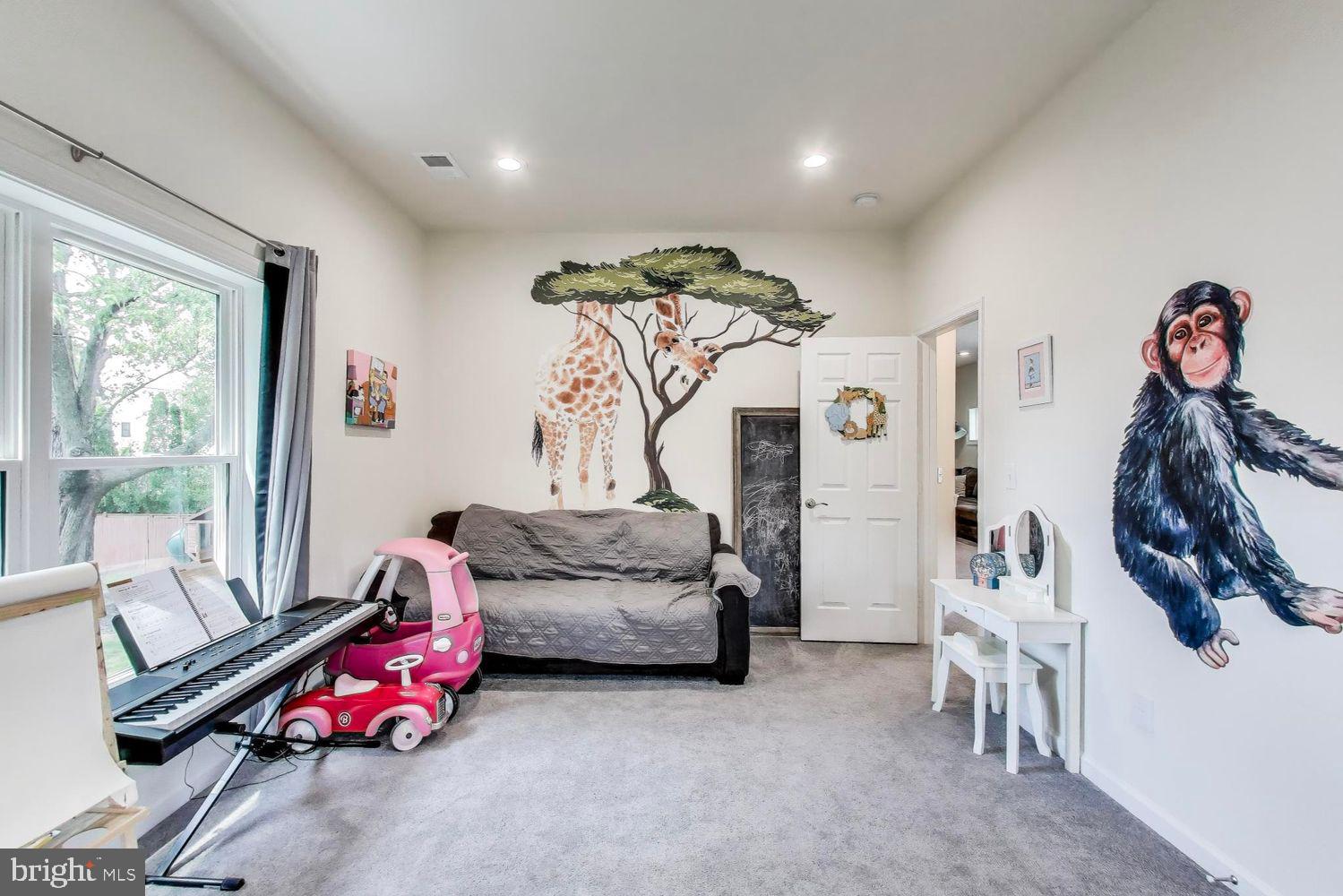 5408 Danville Street Springfield, VA 22151 - Photo 16 of 29 a bedroom with furniture and a window