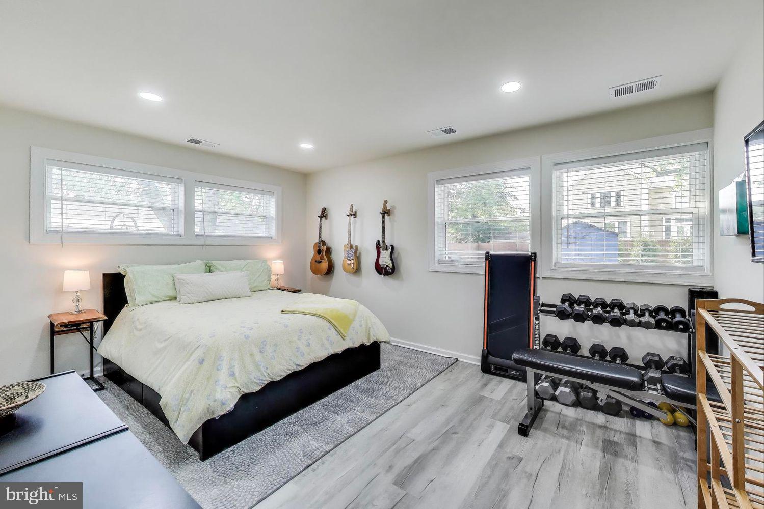 5408 Danville Street Springfield, VA 22151 - Photo 17 of 29 a bed room with a bed and a window