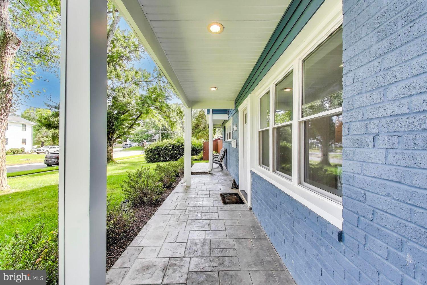 5408 Danville Street Springfield, VA 22151 - Photo 2 of 29 a view of a porch with wooden floor and garden